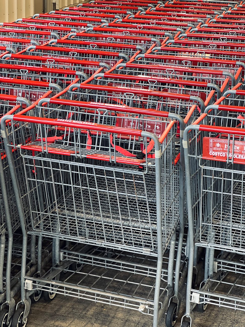 stacked shopping carts at retail store entrance